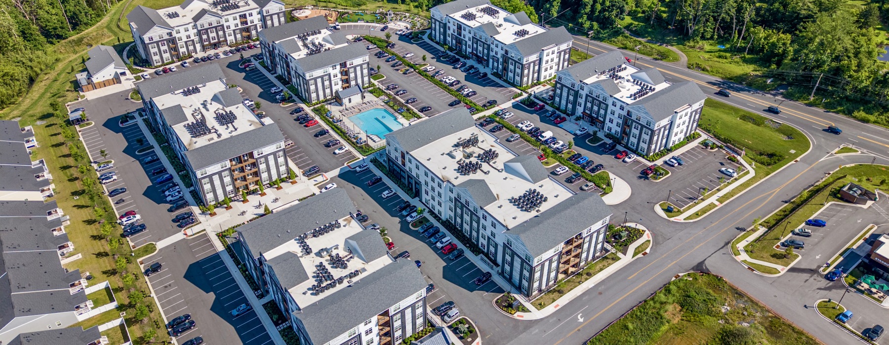 an aerial showing all seven buildings of james run apartments