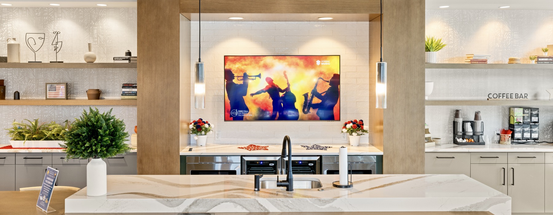 a large kitchen with a large dining area in clubhouse