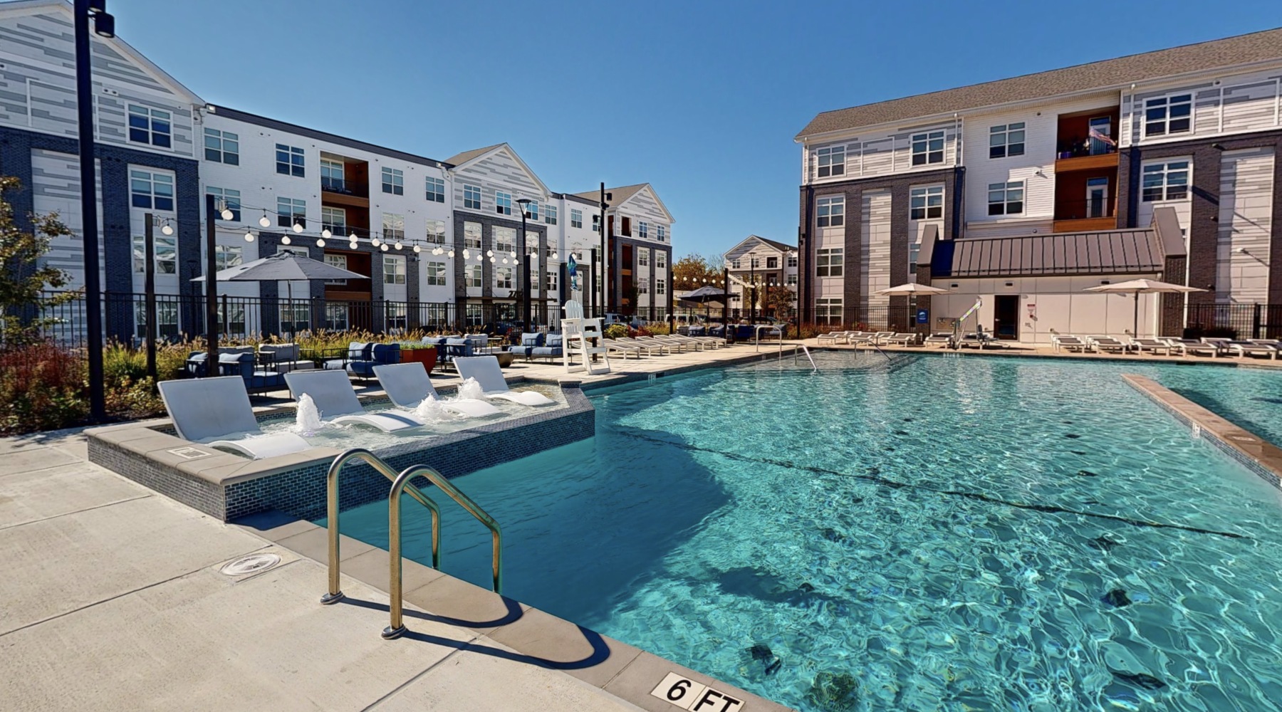 pool with lounge chairs